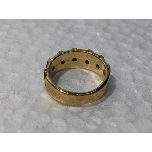 648 - A YELLOW METAL RING MARKED 18KT SIZE L IN A PRESENTATION BOX