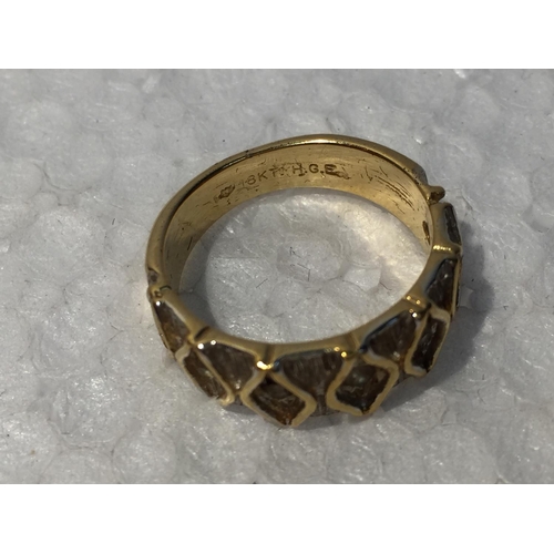 648 - A YELLOW METAL RING MARKED 18KT SIZE L IN A PRESENTATION BOX