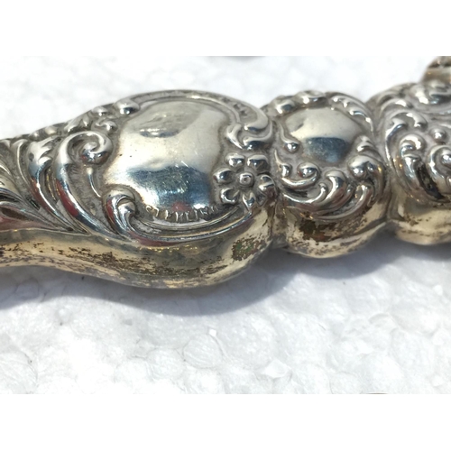 667 - A VINTAGE HALLMARKED BIRMINGHAM AND STERLING SILVER BUTTON HOOK, BRUSH, PERFUME TOP AND CONDIMENT RI... 