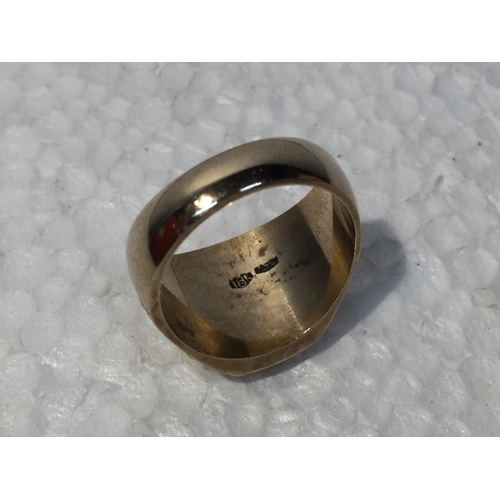 675 - A YELLOW METAL RING STAMPED 18K