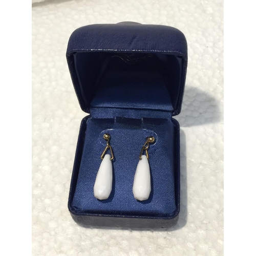 677 - A PAIR OF GOLD EARRINGS IN A PRESENTATION BOX