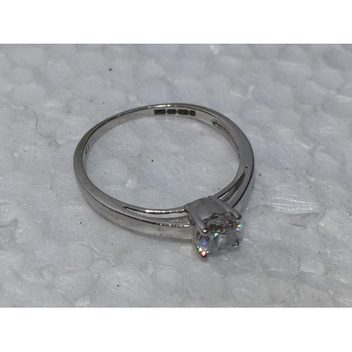 680 - A 9CT WHITE GOLD RING WITH CUBIC ZIRCONIA STONES