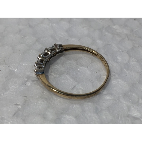 683 - A 9CT GOLD RING WITH DIAMONDS