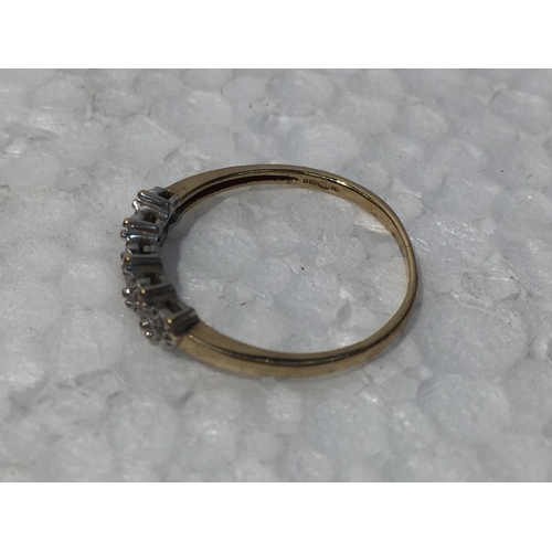 683 - A 9CT GOLD RING WITH DIAMONDS