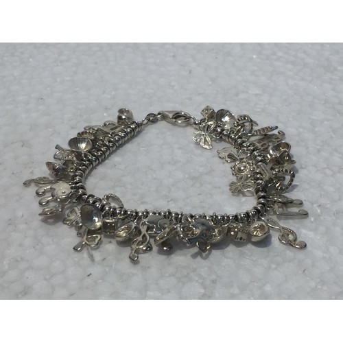 685 - A SILVER CHARM BRACELET