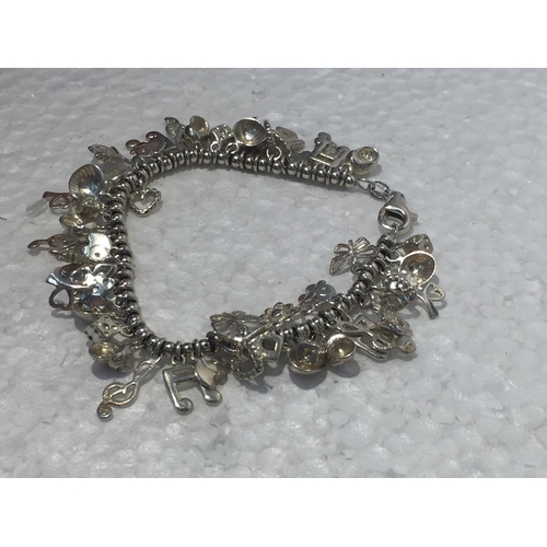 685 - A SILVER CHARM BRACELET