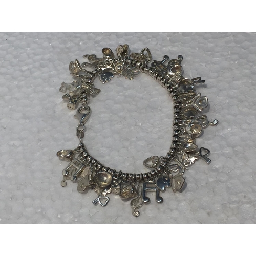 685 - A SILVER CHARM BRACELET