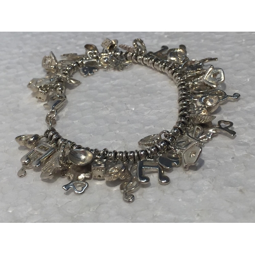 685 - A SILVER CHARM BRACELET