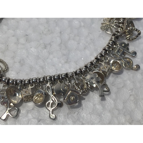 685 - A SILVER CHARM BRACELET