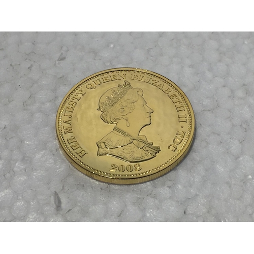 686 - A SILVER GILT 2008 £5 COIN DEPICTING GEORGE AND THE DRAGON WITH RUBIES