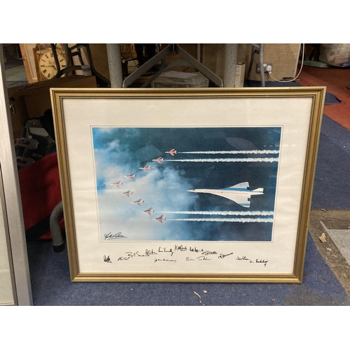 358 - A FRAMED PRINT OF CONCORDE FLYING WITH THE RED ARROWS WITH SIGNATURES TO THE BOTTOM 54CM X 43.5CM