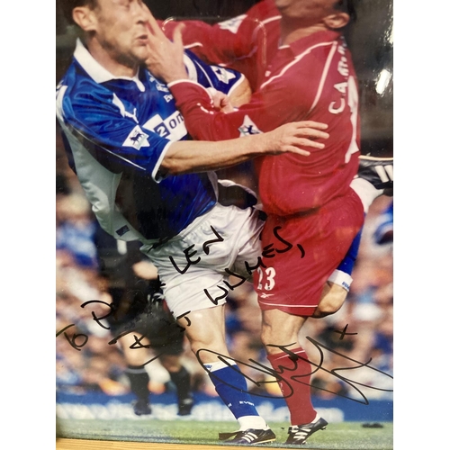 403 - A FRAMED PHOTO OF DUNCAN FERGUSON AND JAMIE CARRAGHER SIGNED - NO PROVENANCE PLUS AN EVERTON F. A. C... 