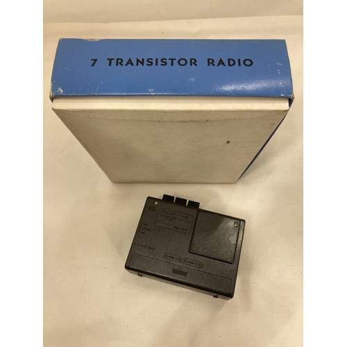 409 - A MELTONE PLANET BOXED TRANSISTOR RADIO AND CASSETTE PLAYER