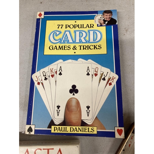 425 - A QUANTITY OF PACKS OF VINTAGE PLAYING CARDS PLUS A CARD GAMES AND TRICKS BOOK