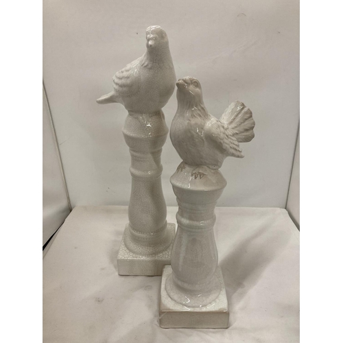 444 - TWO VINTAGE STYLE COLUMNS WITH PIGEONS HEIGHTS 45CM AND 39CM