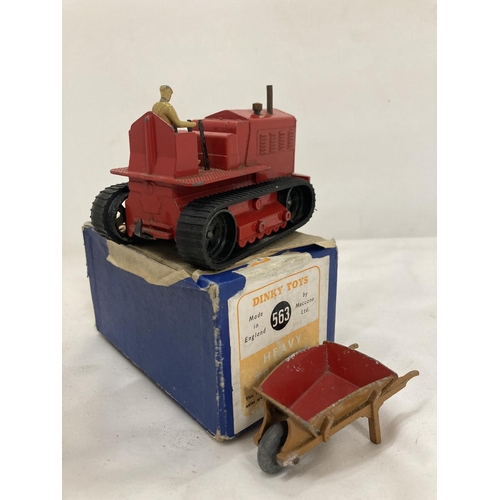 446 - A DINKY TOYS HEAVY TRACTOR NUMBER 563 - BOXED, AND A DINKY TOYS WHEELBARROW