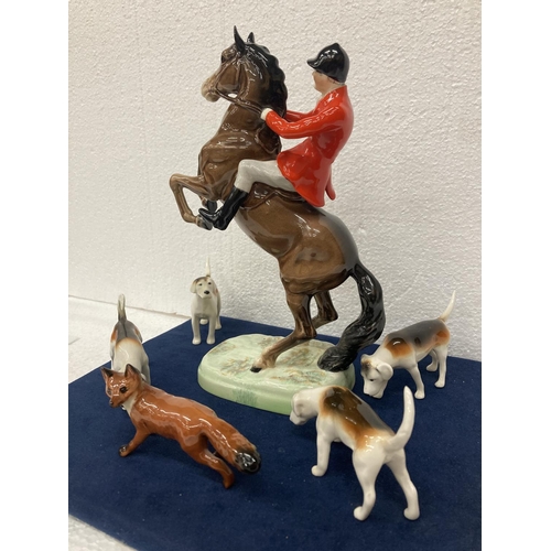 778 - A BESWICK 'REARING HUNTSMAN' MODEL NUMBER 868 HEIGHT 25CM/10 INCHES, A FOX AND FOUR HOUNDS.  ALL IN ... 