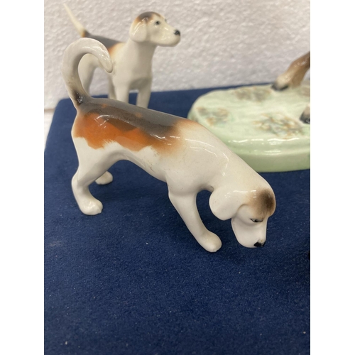 778 - A BESWICK 'REARING HUNTSMAN' MODEL NUMBER 868 HEIGHT 25CM/10 INCHES, A FOX AND FOUR HOUNDS.  ALL IN ... 