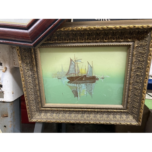 812 - A GILT FRAMED PAINTING ON GLASS OF A SAILING BOAT 28CM X 24 CM PLUS A FRAMED PRINT OF YACHTS