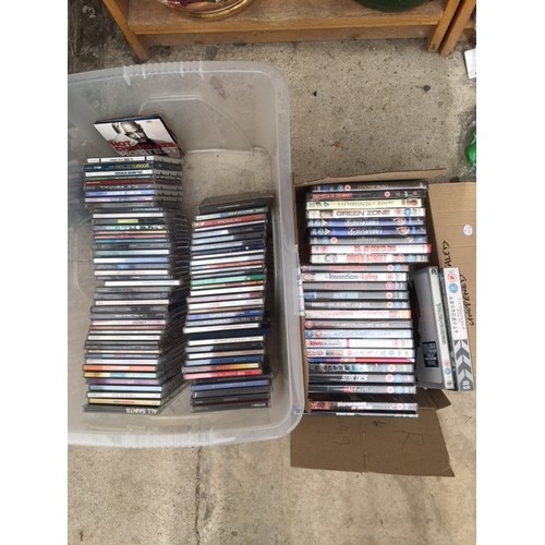 1400 - AN ASSORTMENT OF CDS AND DVDS