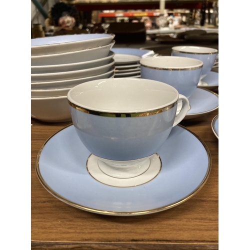 887 - A QUANTITY 0F POWDER BLUE AND WHITE DINNERWARE TO INCLUDE CUPS, SAUCERS, PLATES, BOWLS, ETC, MARKED ... 