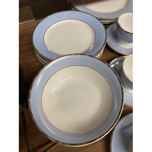 887 - A QUANTITY 0F POWDER BLUE AND WHITE DINNERWARE TO INCLUDE CUPS, SAUCERS, PLATES, BOWLS, ETC, MARKED ... 