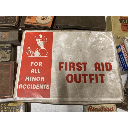 906 - A VINTAGE SUITCASE CONTAINING A LARGE QUANTITY OF VINTAGE TINS TO INCLUDE A VINTAGE FIRST AID OUTFIT... 