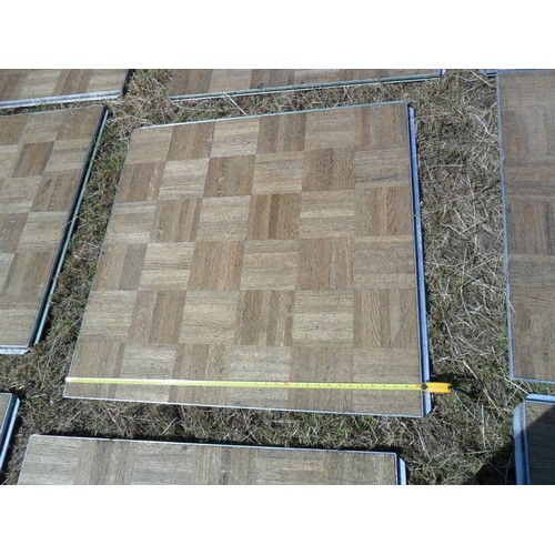 1348 - A LARGE INTERLOCKING WOODEN DANCE FLOOR WITH WHEELED TROLLEY