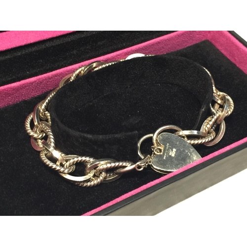 688 - A HALLMARKED BIRMINGHAM SILVER BRACELET WITH HEART SHAPED CLASP