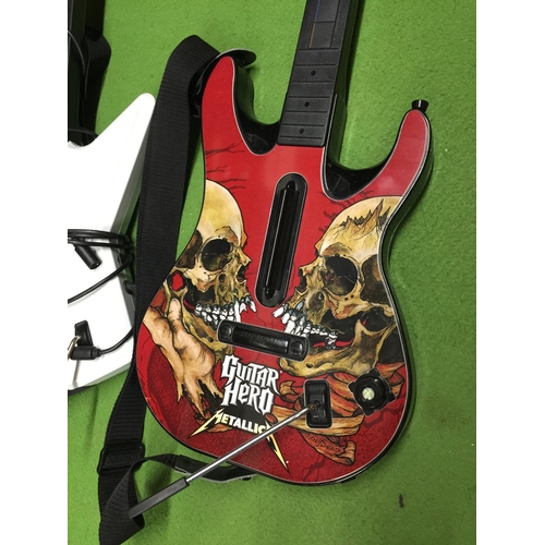 911 - A 'GUITAR HERO' GUITAR AND AN X BOX GUITAR