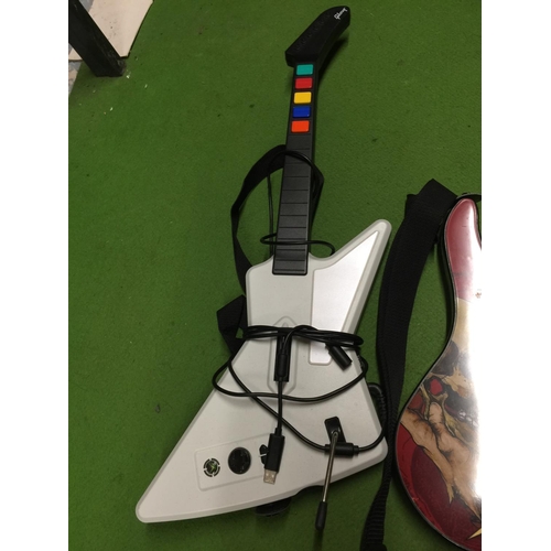 911 - A 'GUITAR HERO' GUITAR AND AN X BOX GUITAR