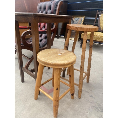 2681 - TWO PINE STOOLS AND AN OAK OCCASIONAL TABLE