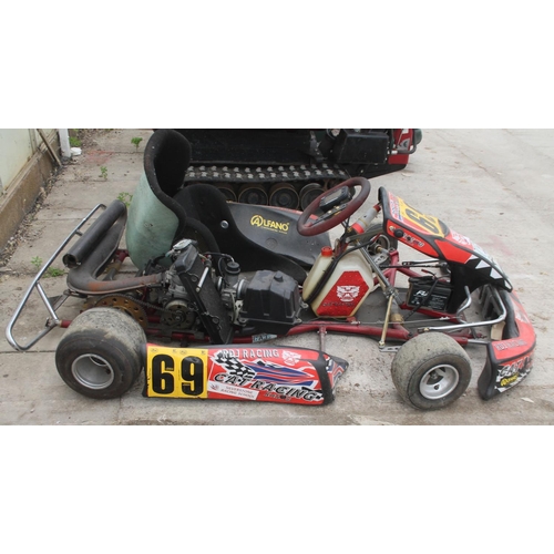 126 - A RACING GO KART WITH ROLSON ENGINE WHICH HAS DONE APPROX 4 HOURS ONLY IT IS GOVERNED FOR JUNIOR RAC... 