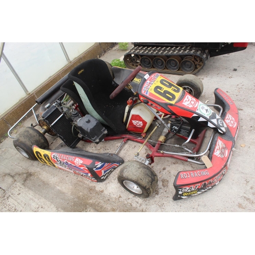 126 - A RACING GO KART WITH ROLSON ENGINE WHICH HAS DONE APPROX 4 HOURS ONLY IT IS GOVERNED FOR JUNIOR RAC... 