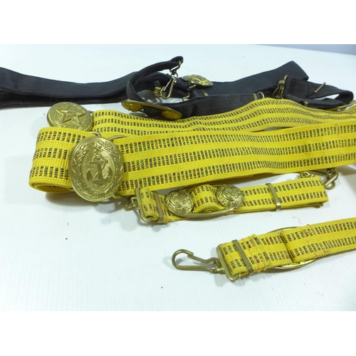 397 - TWO NAVAL SWORD BELTS AND A RUSSIAN BELT