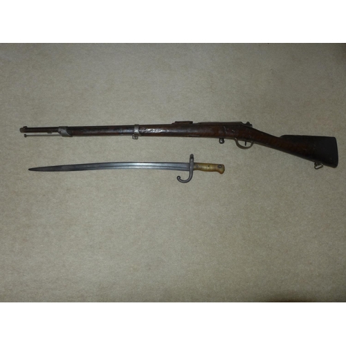 406 - A FRENCH OBSOLETE CALIBRE CHASSEPOT RIFLE DATED 1876 AND BAYONET, 64CM BARREL, LACKING NEEDLE