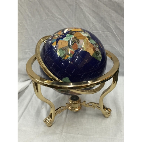 12 - A GLOBE WITH MOTHER OF PEARL INLAYS ON BRASS ROTATING STAND H: 45CM