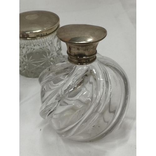 17 - FIVE VINTAGE SILVER AND CUT GLASS ITEMS TO INCLUDE ENAMELLED SILVER LIDDED GLASS JARS, DECANTER WITH... 