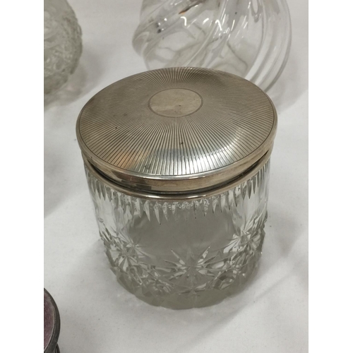 17 - FIVE VINTAGE SILVER AND CUT GLASS ITEMS TO INCLUDE ENAMELLED SILVER LIDDED GLASS JARS, DECANTER WITH... 