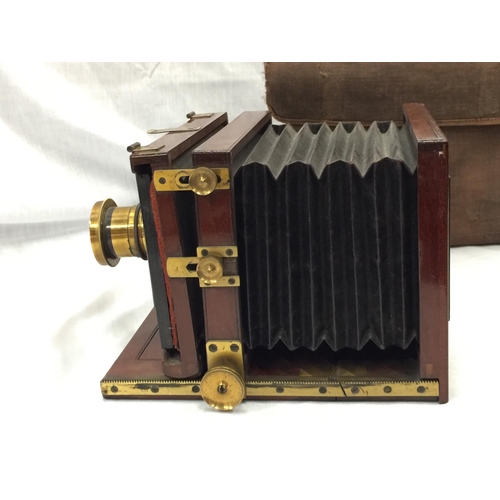 4 - A 19TH CENTURY W.I. CHADWICK PATENT CAMERA IN A LEATHER CASE WITH MANCHESTER 2258 LENS ATTACHMENT