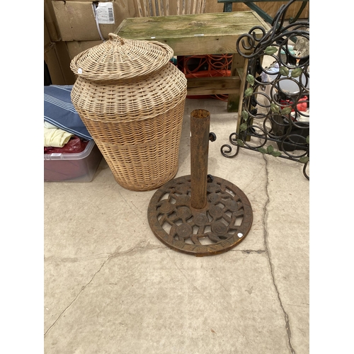 1496 - A COLLECTION OF ITEMS TO INCLUDE A CAST IRON PARASOL BASE, A METAL 9 BOTTLE WINE RACK AND A GARDEN T... 