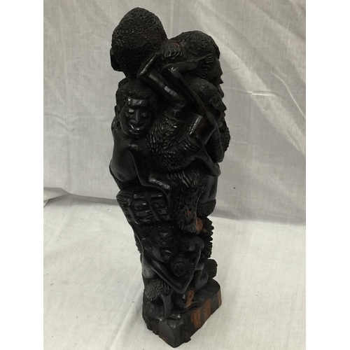 45 - A LARGE HAND CARVED AFRICAN TRIBAL STYLE FIGURE H: 54CM