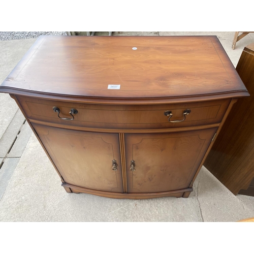 2647 - A MODERN YEW WOOD BOWFRONTED SIDEBOARD WITH TWO DRAWERS AND TWO CUPBOARDS, 31