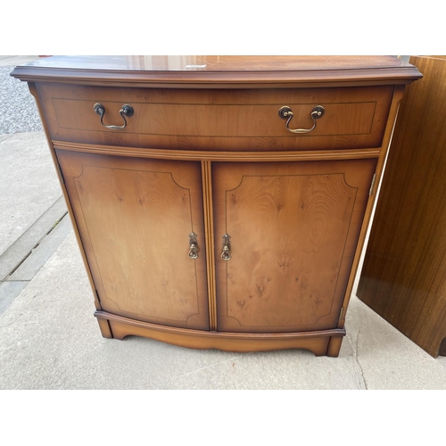 2647 - A MODERN YEW WOOD BOWFRONTED SIDEBOARD WITH TWO DRAWERS AND TWO CUPBOARDS, 31