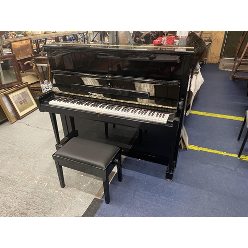 50 - A STEINWAY AND SONS UPRIGHT PIANO - NUMBERED 600732 - BELIEVED MANUFACTURED IN 2015 COSTING IN EXCES... 