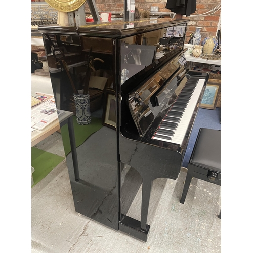 50 - A STEINWAY AND SONS UPRIGHT PIANO - NUMBERED 600732 - BELIEVED MANUFACTURED IN 2015 COSTING IN EXCES... 