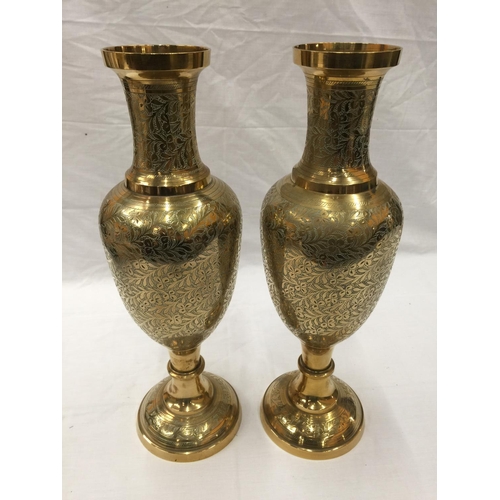 15 - A PAIR OF HEAVY BRASS INDIAN STYLE VASES WITH ETCHED FLORAL LEAF DESIGN H: 45CM