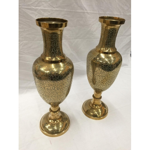 15 - A PAIR OF HEAVY BRASS INDIAN STYLE VASES WITH ETCHED FLORAL LEAF DESIGN H: 45CM