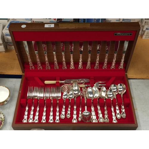 18 - A 48 PIECE COMMUNITY FLATWARE SET IN DISPLAY CASE