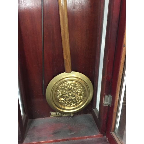 24 - AN ART NOUVEAU STYLE MAHOGANY CASED WALL CLOCK WITH BRASS AND SILVERED DIAL